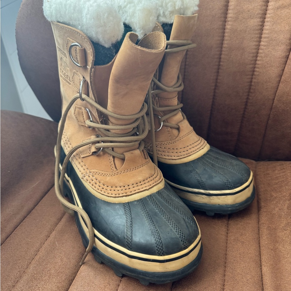 Sorel Tan and Black Winter Boots